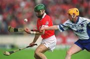 26 May 2002; Cork's Jerry O'Connor is tackled by Waterford's Eoin Murphy during the Guinness Munster Senior Hurling Championship Semi-Final match between Waterford and Cork at Semple Stadium in Thurles, Tipperary. Photo by Brendan Moran/Sportsfile