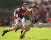 19 May 2002; Columba Holleran of Mayo in action against Michael Meehan of Galway during the Connacht Minor Football Championship Quarter-Final match between Mayo and Galway at Dr Hyde Park in Roscommon. Photo by Damien Eagers/Sportsfile