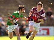 19 May 2002; Columba Holleran of Mayo in action against Michael Meehan of Galway during the Connacht Minor Football Championship Quarter-Final match between Mayo and Galway at Dr Hyde Park in Roscommon. Photo by Damien Eagers/Sportsfile
