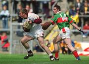 19 May 2002; Galway goalkeeper Michael Killilea in action against Mayo's David Geraghty during the Connacht Minor Football Championship Quarter-Final match between Mayo and Galway at Dr Hyde Park in Roscommon. Photo by Damien Eagers/Sportsfile