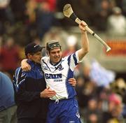 26 May 2002; Waterford's Paul Flynn celebrates with a team official following their side's victory during the Guinness Munster Senior Hurling Championship Semi-Final match between Waterford and Cork at Semple Stadium in Thurles, Tipperary. Photo by Brendan Moran/Sportsfile