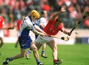 26 May 2002; Eoin Murphy of Waterford in action against Fergal McCormack of Cork during the Guinness Munster Senior Hurling Championship Semi-Final match between Waterford and Cork at Semple Stadium in Thurles, Tipperary. Photo by Brendan Moran/Sportsfile