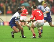 26 May 2002; Seamus Prendergast of Waterford in action against Diarmuid O'Sullivan of Cork during the Guinness Munster Senior Hurling Championship Semi-Final match between Waterford and Cork at Semple Stadium in Thurles, Tipperary. Photo by Brendan Moran/Sportsfile