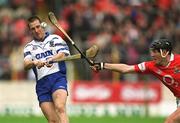26 May 2002; Ken McGrath of Waterford in action against John Browne of Cork during the Guinness Munster Senior Hurling Championship Semi-Final match between Waterford and Cork at Semple Stadium in Thurles, Tipperary. Photo by Brendan Moran/Sportsfile