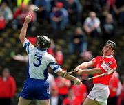 26 May 2002; Tony Feeney of Waterford in action against Eamonn Collins of Cork during the Guinness Munster Senior Hurling Championship Semi-Final match between Waterford and Cork at Semple Stadium in Thurles, Tipperary. Photo by Brendan Moran/Sportsfile