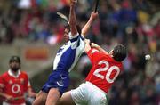 26 May 2002; Waterford's Tony Browne contests a high ball with Cork's Pat Ryan during the Guinness Munster Senior Hurling Championship Semi-Final match between Waterford and Cork at Semple Stadium in Thurles, Tipperary. Photo by Brendan Moran/Sportsfile