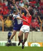 26 May 2002; Waterford's Fergal Hartley contests a high ball with Cork's Fergal McCormack during the Guinness Munster Senior Hurling Championship Semi-Final match between Waterford and Cork at Semple Stadium in Thurles, Tipperary. Photo by Brendan Moran/Sportsfile