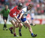 26 May 2002; Cork's Ben O'Connor, left, tussles for possession with Waterford's Tony Browne during the Guinness Munster Senior Hurling Championship Semi-Final match between Waterford and Cork at Semple Stadium in Thurles, Tipperary. Photo by Brendan Moran/Sportsfile