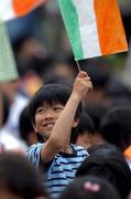 27 May 2002; 5 year old Kazushi Sinorhara from Izumo cheers on the Republic of Ireland players during a Republic of Ireland squad training session at Izumo Sports Park in Izumo, Japan. Photo by David Maher/Sportsfile