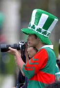 27 May 2002; A local photographs the players during a Republic of Ireland squad training session at Izumo Sports Park in Izumo, Japan. Photo by David Maher/Sportsfile