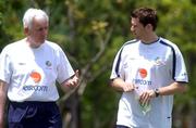27 May 2002; Kevin Kilbane, right, who did not take part during squad training, chats with team doctor Martin Walsh during a Republic of Ireland squad training session at Izumo Sports Park in Izumo, Japan. Photo by David Maher/Sportsfile