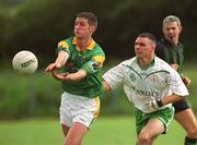 26 May 2002; Michael Duignan of Leitrim in action against London's Padraig McDonagh during the Bank of Ireland Connacht Senior Football Championship Quarter-Final match between London and Leitrim at the Emerald GAA Grounds in Ruislip, London, England. Photo by Brian Lawless/Sportsfile