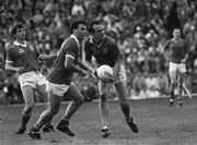 20 September 1987; Mick Lyons of Meath in action against Jimmy Kerrigan of Cork during the All-Ireland Senior Football Championship Final match between Meath and Cork at Croke Park in Dublin. Photo by Ray McManus/Sportsfile
