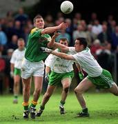 26 May 2002; Michael Duignan of Leitrim in action against London's Colm McHugh during the Bank of Ireland Connacht Senior Football Championship Quarter-Final match between London and Leitrim at the Emerald GAA Grounds in Ruislip, London, England. Photo by Brian Lawless/Sportsfile