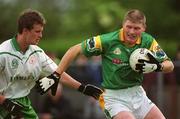 26 May 2002; Oliver Maguire of Leitrim in action against London's Kieran McCarthy during the Bank of Ireland Connacht Senior Football Championship Quarter-Final match between London and Leitrim at the Emerald GAA Grounds in Ruislip, London, England. Photo by Brian Lawless/Sportsfile