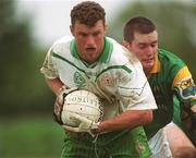 26 May 2002; Kevin Waldron of London in action against Shane Canning of Leitrim during the Bank of Ireland Connacht Senior Football Championship Quarter-Final match between London and Leitrim at the Emerald GAA Grounds in Ruislip, London, England. Photo by Brian Lawless/Sportsfile