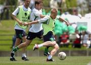 28 May 2002; Damien Duff, centre, Kenny Cunningham and Niall Quinn during a Republic of Ireland squad training session at Izumo Sports Park in Izumo, Japan. Photo by David Maher/Sportsfile