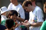 29 May 2002; Kevin Kilbane signs autographs following a Republic of Ireland squad training session at Izumo Sports Park in Izumo, Japan. Photo by David Maher/Sportsfile