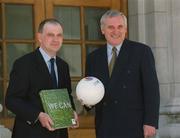 29 May 2002; An Taoiseach Bertie Ahern, T.D., right, and Bid Director John Henderson after signing the Scotland - Ireland UEFA Euro 2008 Bid at Government Buildings in Dublin. Photo by Ray McManus/Sportsfile
