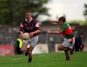 19 May 2002; Fergal McCann of Galway is tackled by Diarmuid Griffin of Mayo during the Connacht Minor Football Championship Quarter-Final match between Mayo and Galway at Dr Hyde Park in Roscommon. Photo by Brian Lawless/Sportsfile