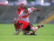 25 May 2002; Martin Coulter Jnr of Down in action against Derry's Ryan Lynch during the Guinness Ulster Senior Hurling Championship Semi-Final match between Down and Derry at Casement Park in Belfast. Photo by Damien Eagers/Sportsfile