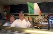 23 May 2002; Republic of Ireland supporters Martin and Claire Greene, from Clondalkin pictured in their Fish Bar, show support for their team ahead of their FIFA World Cup 2002 Group E opening match against Cameroon on 1st June. Photo by Damien Eagers/Sportsfile