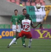 1 June 2002; Mark Kinsella of Republic of Ireland in action against Cameroon's Lauren during the FIFA World Cup 2002 Group E match between Republic of Ireland and Cameroon at Big Swan Stadium in Niigata, Japan. Photo by David Maher/Sportsfile