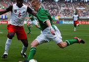 1 June 2002; Damien Duff of Republic of Ireland in action against Cameroon's Raymond Kalla during the FIFA World Cup 2002 Group E match between Republic of Ireland and Cameroon at Big Swan Stadium in Niigata, Japan. Photo by David Maher/Sportsfile