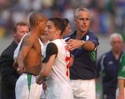 1 June 2002; Republic of Ireland manager Mick McCarthy, right, with players Stephen Reid and Matt Holland following their side's draw during the FIFA World Cup 2002 Group E match between Republic of Ireland and Cameroon at Big Swan Stadium in Niigata, Japan. Photo by David Maher/Sportsfile