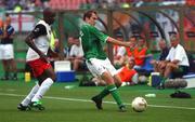 1 June 2002; Jason McAteer of Republic of Ireland in action against Bill Tchato of Cameroon during the FIFA World Cup 2002 Group E match between Republic of Ireland and Cameroon at Big Swan Stadium in Niigata, Japan. Photo by David Maher/Sportsfile