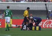 1 June 2002; Republic of Ireland goalkeeper Shay Given receives treatment from physio Mick Byrne during the FIFA World Cup 2002 Group E match between Republic of Ireland and Cameroon at Big Swan Stadium in Niigata, Japan. Photo by David Maher/Sportsfile