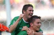 1 June 2002; Matt Holland of Republic of Ireland, right, celebrates with team-mate Robbie Keane after scoring his side's equalising goal during the FIFA World Cup 2002 Group E match between Republic of Ireland and Cameroon at Big Swan Stadium in Niigata, Japan. Photo by David Maher/Sportsfile