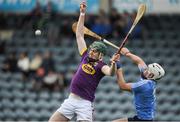 13 May 2017; Jack Cullen of Wexford contests a high ball with Ben McHugh of Dublin during the Electric Ireland Leinster GAA Hurling Minor Championship Semi-Final game between Dublin and Wexford at Parnell Park in Dublin. Photo by Brendan Moran/Sportsfile
