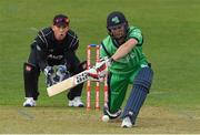 14 May 2017; Andrew Balbirnie of Ireland hits a single off Mitchell Santner of New Zealand watched by wicketkeeper Luke Ronchi during the One Day International match between Ireland and New Zealand at Malahide Cricket Club in Dublin. Photo by Brendan Moran/Sportsfile