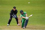 14 May 2017; Barry McCarthy of Ireland hits a delivery from Mitchell Santner of New Zealand before being caught by Tom Latham of New Zealand during the One Day International match between Ireland and New Zealand at Malahide Cricket Club in Dublin. Photo by Brendan Moran/Sportsfile
