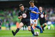 13 May 2017; Eóin Hastings of Cobh Wanderers is tackled by Aidan Roche of Liffey Wanderers during the FAI Umbro Intermediate Challenge Cup game between Cobh Wanderers and Liffey Wanderers at the Aviva Stadium in Dublin. Photo by Ramsey Cardy/Sportsfile
