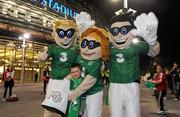 15 November 2011; The Three mascots meet Republic of Ireland fan Stephen Kelly, age 6, from Newport, Co. Tipperary, ahead of the Republic of Ireland v Estonia game in Aviva stadium. The mascots were on hand to help cheer on the boys in green for the second leg qualifier. The stadium will be turning green tonight as Three has put go Green with Pride cards on each seat in the stadium for fans to hold up and support the team. Aviva Stadium, Lansdowne Road, Dublin. Picture credit: Stephen McCarthy / SPORTSFILE