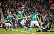 15 November 2011; Republic of Ireland's Stephen Ward, centre, celebrates after scoring his side's first goal, after 32 minutes, with team-mates Robbie Keane, right, and Keith Andrews. UEFA EURO2012 Qualifying Play-off 2nd leg, Republic of Ireland v Estonia, Aviva Stadium, Lansdowne Road, Dublin. Picture credit: Pat Murphy / SPORTSFILE