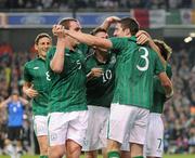 15 November 2011; Republic of Ireland's Stephen Ward, 3, celebrates after scoring his side's first goal, after 32 minutes, with team-mates, from left, Keith Andrews, Richard Dunne, Robbie Keane, and Stephen Hunt. UEFA EURO2012 Qualifying Play-off 2nd leg, Republic of Ireland v Estonia, Aviva Stadium, Lansdowne Road, Dublin. Picture credit: Pat Murphy / SPORTSFILE