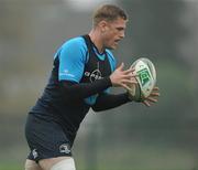 16 November 2011; Leinster's Jamie Heaslip in action during squad training ahead of their Heineken Cup Pool 3 Round 2 match against Glasgow Warriors on Sunday. Leinster rugby squad training, Thornfields, UCD, Belfield, Dublin. Picture credit: Matt Browne / SPORTSFILE