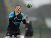 16 November 2011; Leinster's Jamie Heaslip in action during squad training ahead of their Heineken Cup Pool 3 Round 2 match against Glasgow Warriors on Sunday. Leinster rugby squad training, Thornfields, UCD, Belfield, Dublin. Picture credit: Matt Browne / SPORTSFILE