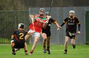 16 November 2011; John Madigan, Charleville CBS, Cork, in action against Ronan Kirby, left, PJ Hall, centre, and Kevin McNamara, right, Ardscoil Rís, Limerick. Munster Colleges Hurling - Dr. Harty Cup, Ardscoil Rís, Limerick v Charleville CBS, Cork, Bruff, Co. Limerick. Picture credit: Diarmuid Greene / SPORTSFILE