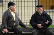 16 November 2011; Christy Burke, left, and Mike Weekes of Bruff GAA Club in conversation during the game. Munster Colleges Hurling - Dr. Harty Cup, Ardscoil Rís, Limerick v Charleville CBS, Cork, Bruff, Co. Limerick. Picture credit: Diarmuid Greene / SPORTSFILE