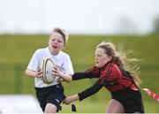 6 May 2017; Josh Cassidy, from Monaghanstown, Co Monaghan, is tackled by Sarah Reynolds, from Ballymote, Co Sligo, during the U11 Tag Rugby event at the Aldi Community Games May Festival 2017 at National Sports Campus, in Abbotstown, Dublin.  Photo by Cody Glenn/Sportsfile