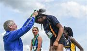 17 May 2017; Yemi Talabi of King's Hospital receiving her silver medal after she finished second in the Junior girls 100m race during the Irish Life Health Leinster Schools Track and Field Day 1 at Morton Stadium in Santry, Dublin. Photo by David Fitzgerald/Sportsfile