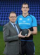 17 November 2011; Leinster's Devin Toner has been voted the Bank of Ireland Leinster Rugby Player of the Month for September / October. There were 7 games in the period for supporters to select their Player of the Month from, including an interprovincial clash with Connacht, and some tough encounters, home and away against PRO12 opponents. Pictured is Devin Toner receiving the award, from Liam Keely, Sponsorships Manager, Bank of Ireland, Donnybrook Stadium, Donnybrook, Dublin. Picture credit: Brian Lawless / SPORTSFILE