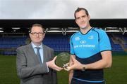 17 November 2011; Leinster's Devin Toner has been voted the Bank of Ireland Leinster Rugby Player of the Month for September / October. There were 7 games in the period for supporters to select their Player of the Month from, including an interprovincial clash with Connacht, and some tough encounters, home and away against PRO12 opponents. Pictured is Devin Toner receiving the award, from Liam Keely, Sponsorships Manager, Bank of Ireland, Donnybrook Stadium, Donnybrook, Dublin. Picture credit: Brian Lawless / SPORTSFILE