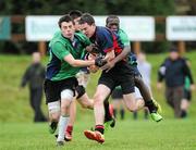 17 November 2011; Ryan Donnelly, Colaiste Chill Mhantain, is tackled by Eoghan Bradshaw, left, and Wolly Mashun, Castleknock CS. Senior Development Cup Semi-Final, Colaiste Chill Mhantain v Castleknock CS, Wicklow RFC, Co. Wicklow. Picture credit: Matt Browne / SPORTSFILE