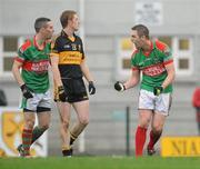 20 November 2011; Enda Coughlan, Kilmurry-Ibrickane, Clare, with Colm Cooper, Dr. Crokes, Kerry, after Cooper was shown a yellow card. AIB Munster GAA Football Senior Club Championship Semi-Final, Dr. Crokes, Kerry v Kilmurry-Ibrickane, Clare, Dr. Crokes GAA Club, Killarney, Co. Kerry. Picture credit: Diarmuid Greene / SPORTSFILE