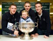 20 November 2011; Dublin players Paul Flynn, Eoghan O'Gara and Kevin Nolan when they signed a copy of the Dublin book  'A Rare Auld Season' for three year old Niamh Flynn, from Ratoath, Co. Meath, in Easons, O'Connell Street, Dublin. Picture credit: Ray McManus / SPORTSFILE